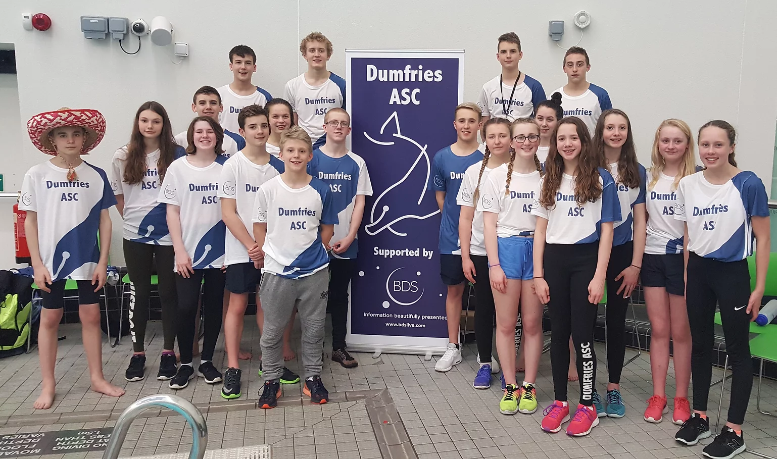 Dumfries ASC swimmers together in their club kit